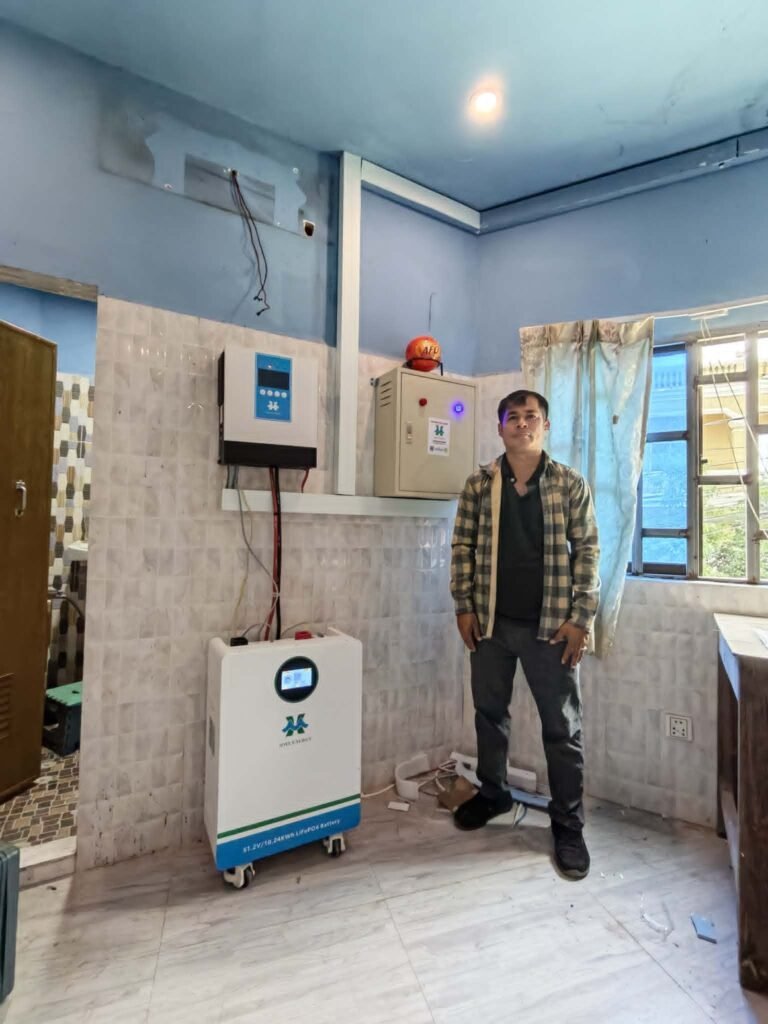 off grid solar battery sizing: Cambodia residential solar energy project on‑site commissioning, local installer team deploying HMX Energy energy storage system